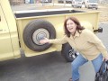 Lisa with Hub cap on her Truck